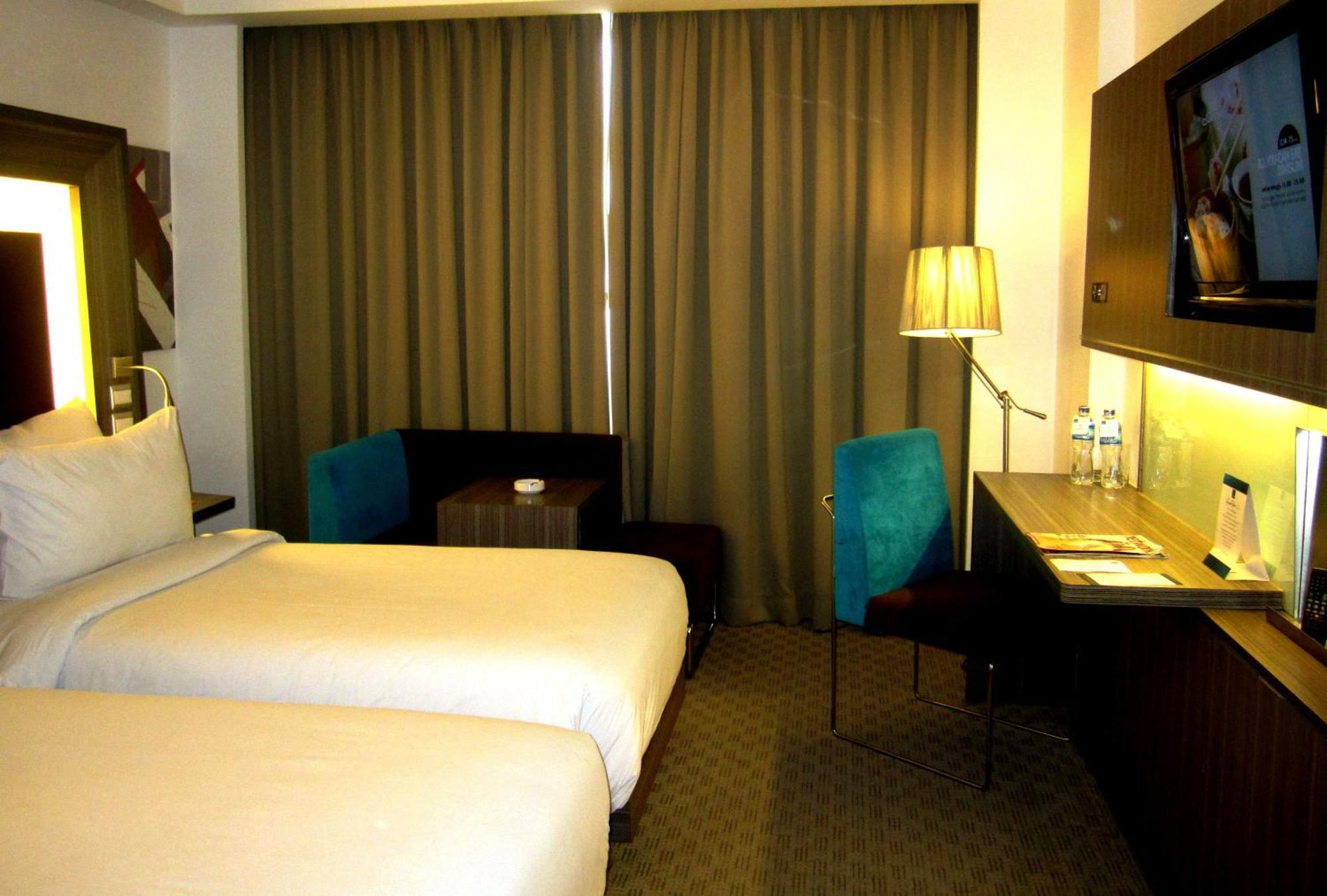 Novotel Bangka Hotel & Convention Center Pangkal Pinang Pokoj fotografie